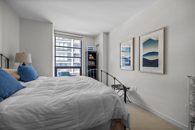 580 Washington St Unit 411, Boston, MA 02111 - carpeted bedroom featuring baseboards