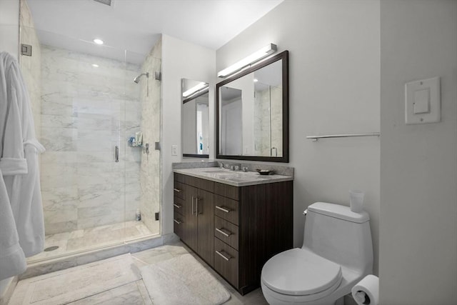 580 Washington St Unit 411, Boston, MA 02111 - bathroom featuring a shower stall, vanity, marble finish floor, toilet, and recessed lighting