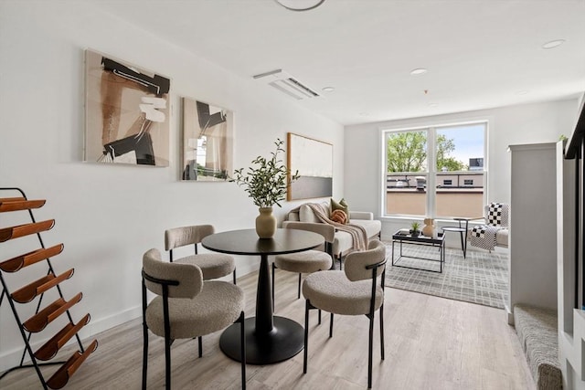 dining room featuring light wood-type flooring