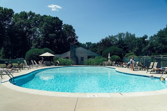 116 Corey Colonial Unit 116, Agawam, MA 01001 - community pool with a patio and view of wooded area