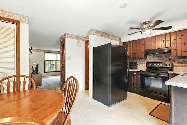 116 Corey Colonial Unit 116, Agawam, MA 01001 - kitchen with black appliances, under cabinet range hood, light countertops, a ceiling fan, and backsplash