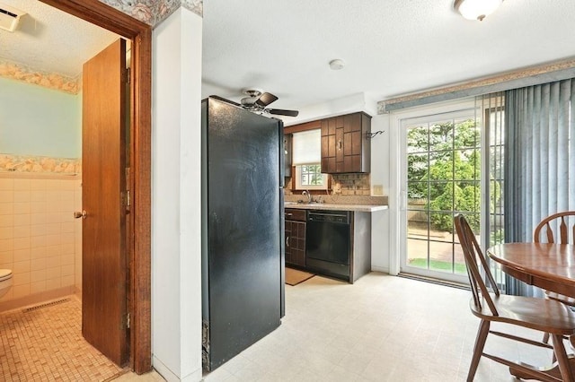 116 Corey Colonial Unit 116, Agawam, MA 01001 - kitchen with black appliances, light countertops, a textured ceiling, a sink, and a ceiling fan