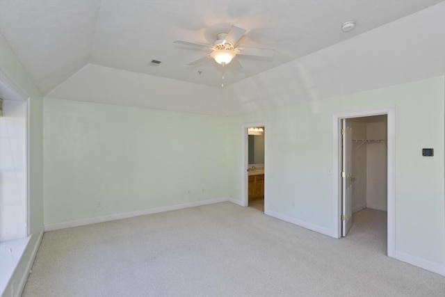61 Providence Rd Unit 4, Grafton, MA 01519 - unfurnished bedroom featuring light carpet, a spacious closet, baseboards, a closet, and lofted ceiling