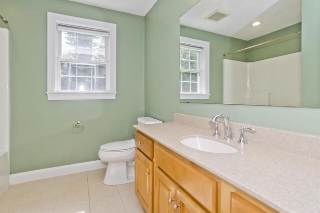 61 Providence Rd Unit 4, Grafton, MA 01519 - full bath with vanity, toilet, tile patterned flooring, and baseboards