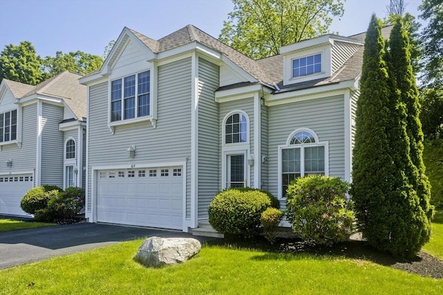 61 Providence Rd Unit 4, Grafton, MA 01519 - traditional-style home featuring a garage, driveway, a front yard, and roof with shingles