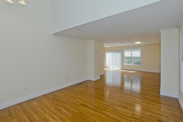 61 Providence Rd Unit 4, Grafton, MA 01519 - empty room with crown molding, light wood-type flooring, and baseboards