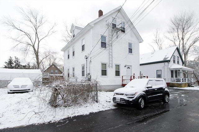 view of snow covered property