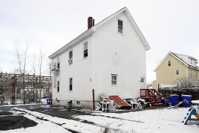 view of snow covered property