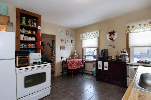 kitchen with white appliances and sink