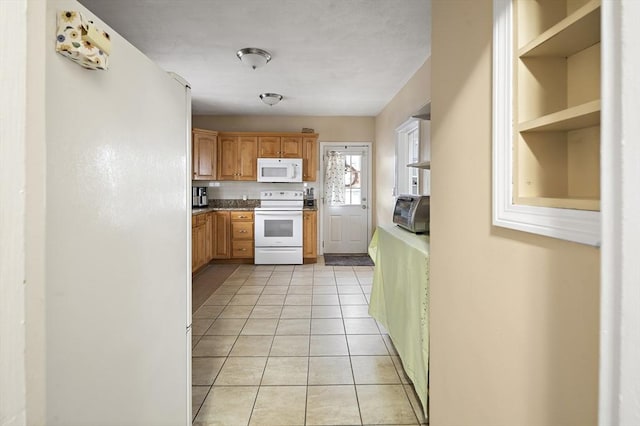 1 Elwood St, Everett, MA 02149 - kitchen featuring white appliances, light tile patterned flooring, tasteful backsplash, and open shelves