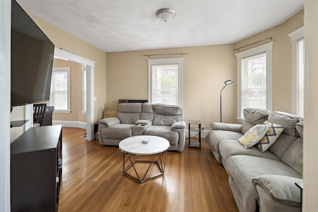 1 Elwood St, Everett, MA 02149 - living area with healthy amount of natural light and wood finished floors