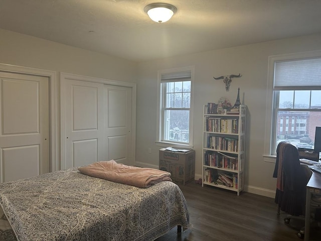 bedroom featuring dark hardwood / wood-style flooring