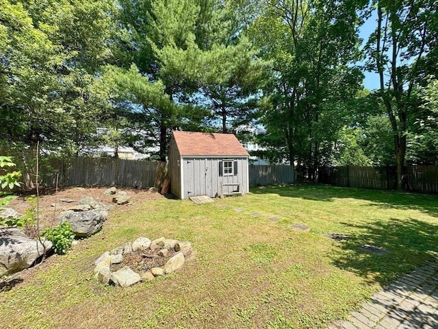 121 N Main St, Natick, MA 01760 - fenced backyard featuring a storage shed