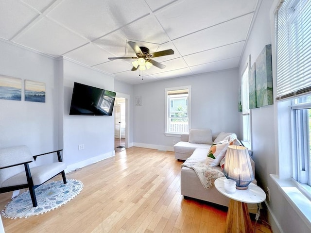 121 N Main St, Natick, MA 01760 - living area with light wood-style flooring and a ceiling fan