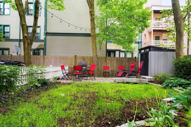 87 Bristol St Unit 3C, Cambridge, MA 02139 - view of yard featuring a patio area
