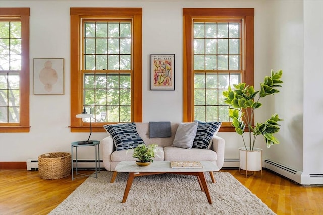 87 Bristol St Unit 3C, Cambridge, MA 02139 - sitting room featuring a baseboard heating unit and healthy amount of natural light