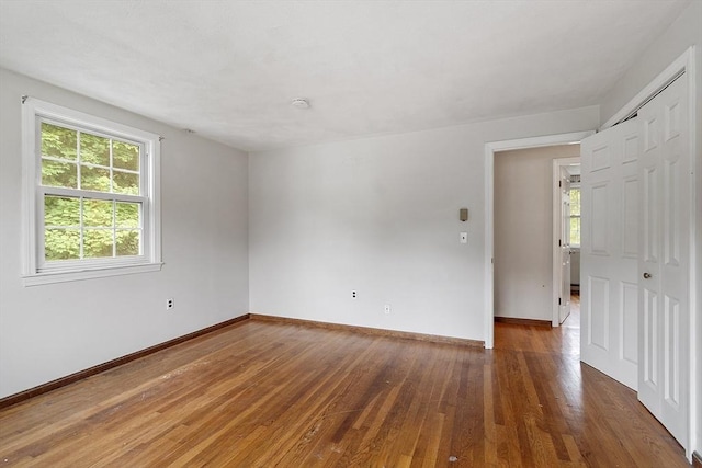 66 Park St, Pepperell, MA 01463 - unfurnished room with hardwood / wood-style floors, healthy amount of natural light, and a smoke detector