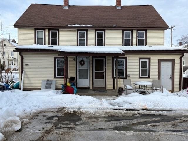 view of front of home with a chimney