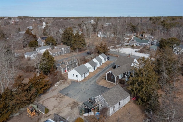 aerial view with a wooded view