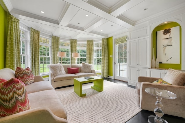 sunroom / solarium with beam ceiling, a healthy amount of sunlight, and coffered ceiling