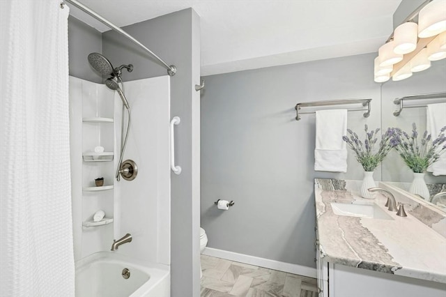 full bathroom featuring toilet, vanity, baseboards, and shower / bath combo