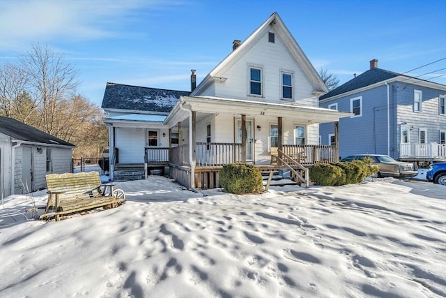 view of front of property featuring covered porch