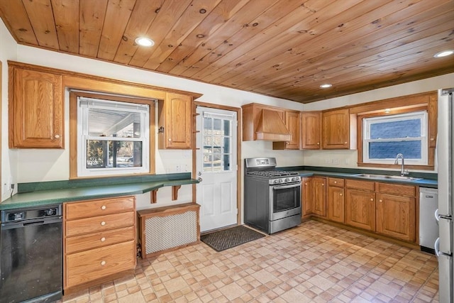 kitchen featuring recessed lighting, premium range hood, a sink, stainless steel gas range, and dishwasher