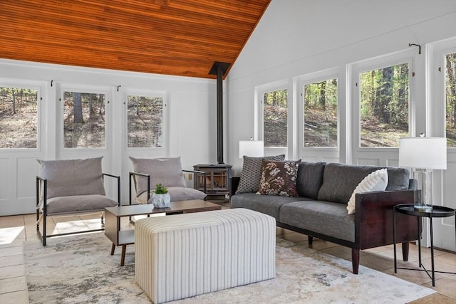 sunroom with a wood stove