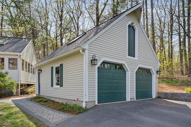 garage featuring driveway