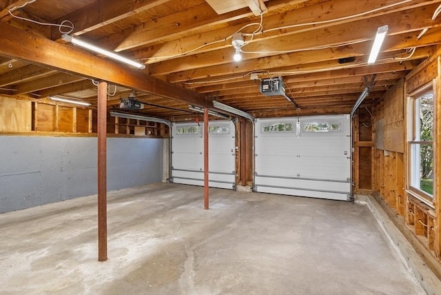 garage featuring a garage door opener