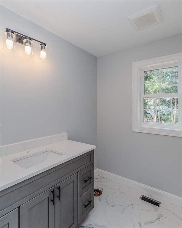 116 Homestead Ave, Springfield, MA 01151 - bathroom with vanity and marble look tile flooring