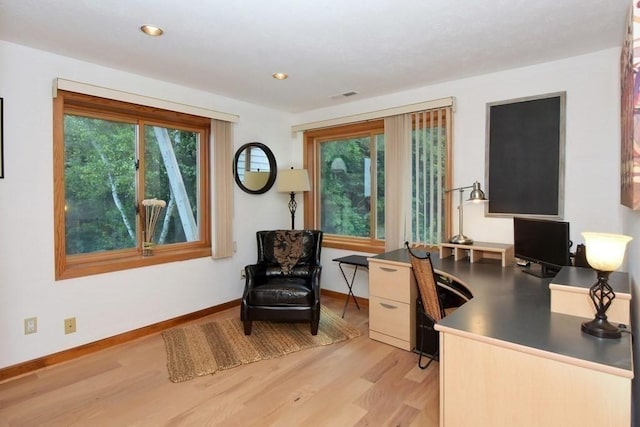 home office with light wood-type flooring