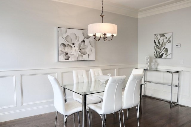 26 Dalby St, Newton, MA 02458 - dining room featuring a decorative wall, ornamental molding, wood finished floors, wainscoting, and a chandelier