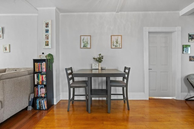 10 Atkins Ave, Lynn, MA 01904 - dining room with wood finished floors, crown molding, and baseboards