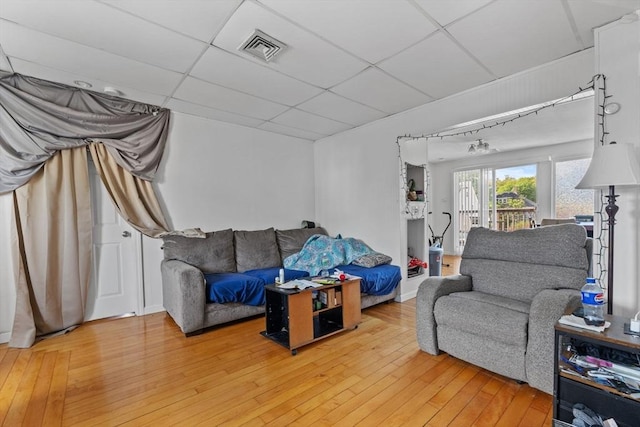 10 Atkins Ave, Lynn, MA 01904 - living area featuring light wood-style floors and a paneled ceiling