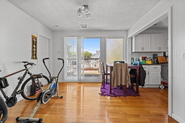 10 Atkins Ave, Lynn, MA 01904 - exercise area with light wood-type flooring and a textured ceiling
