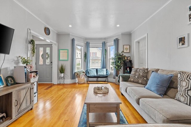 10 Atkins Ave, Lynn, MA 01904 - living room with ornamental molding, light wood-type flooring, recessed lighting, and baseboards