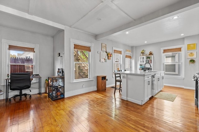 10 Atkins Ave, Lynn, MA 01904 - kitchen with a sink, light wood-style floors, baseboards, white cabinetry, and beam ceiling