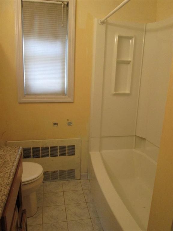 26 Horseshoe Dr Unit 26, Chicopee, MA 01022 - full bath featuring radiator, vanity, tile patterned flooring, and shower / bath combination