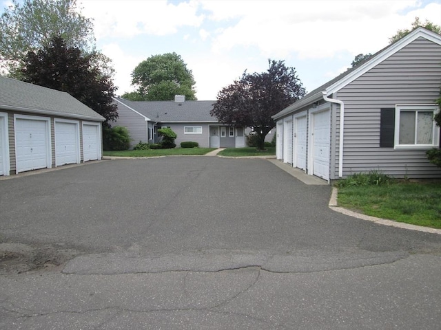 26 Horseshoe Dr Unit 26, Chicopee, MA 01022 - view of street featuring community garages