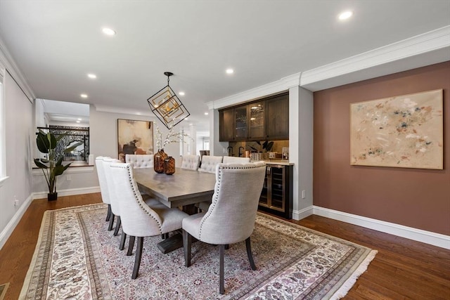 8 Whispering Hill Rd, Woburn, MA 01801 - dining area featuring baseboards, recessed lighting, indoor wet bar, and dark wood-type flooring