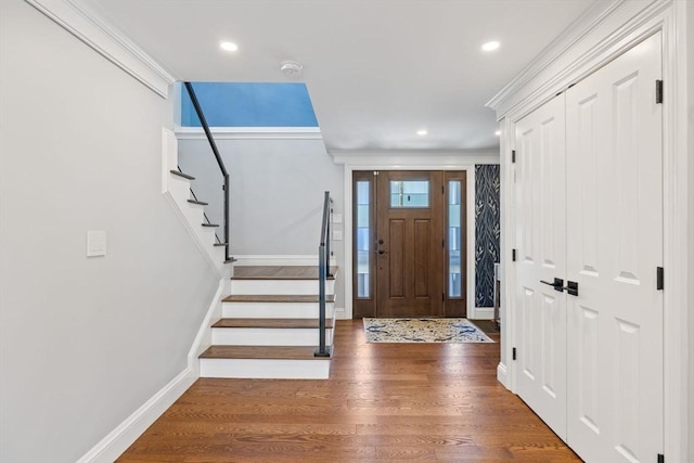 8 Whispering Hill Rd, Woburn, MA 01801 - foyer with crown molding, wood finished floors, baseboards, and stairs