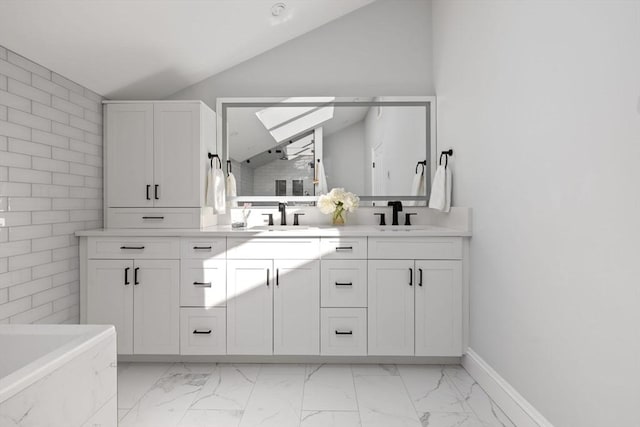 8 Whispering Hill Rd, Woburn, MA 01801 - bathroom with double vanity, marble finish floor, lofted ceiling, and a sink