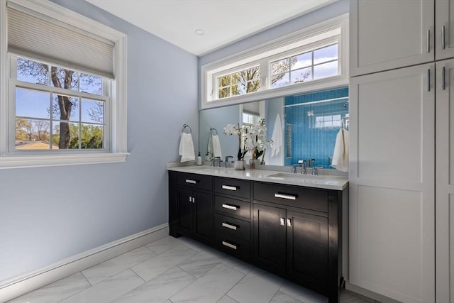8 Whispering Hill Rd, Woburn, MA 01801 - bar with baseboards, marble finish floor, and a sink