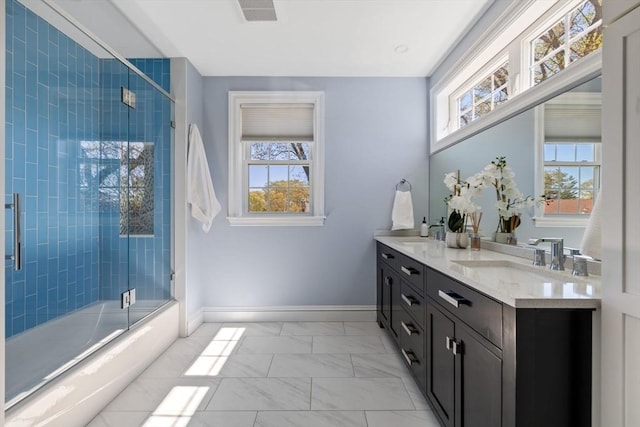 8 Whispering Hill Rd, Woburn, MA 01801 - bathroom with double vanity, a sink, visible vents, baseboards, and marble finish floor