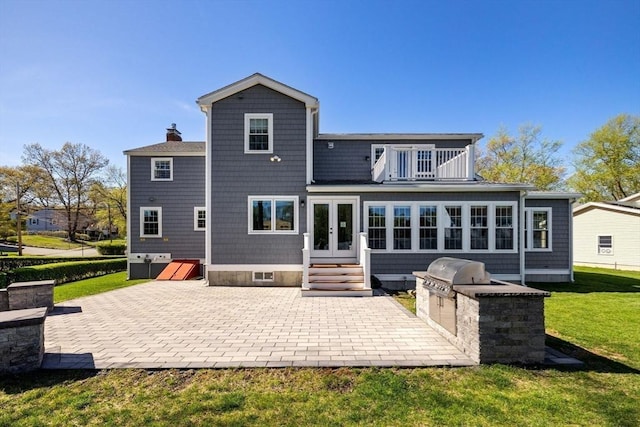 8 Whispering Hill Rd, Woburn, MA 01801 - back of property with a balcony, a yard, an outdoor kitchen, french doors, and a patio area