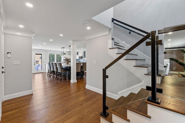 8 Whispering Hill Rd, Woburn, MA 01801 - stairs with wood finished floors, baseboards, ornamental molding, and recessed lighting