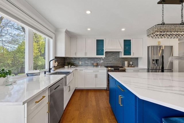 8 Whispering Hill Rd, Woburn, MA 01801 - kitchen featuring a sink, stainless steel appliances, decorative backsplash, custom range hood, and dark wood-style floors