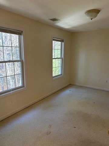 view of carpeted spare room