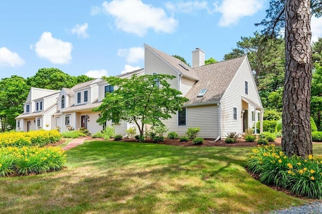 view of front of house with a front lawn